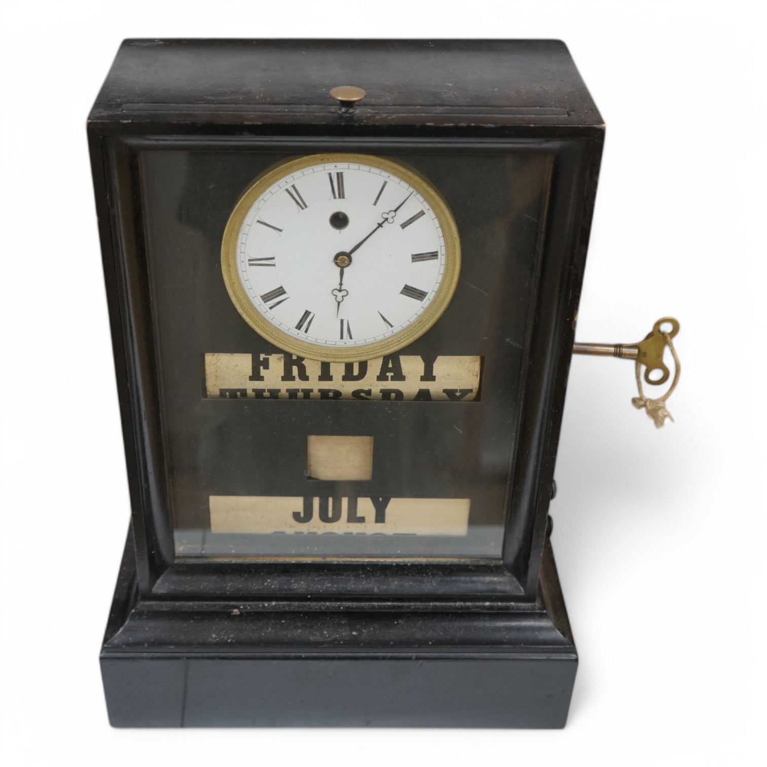 A 19th century ebonised mantel clock combined perpetual calendar with key, 43cm high. Condition - fair, untested